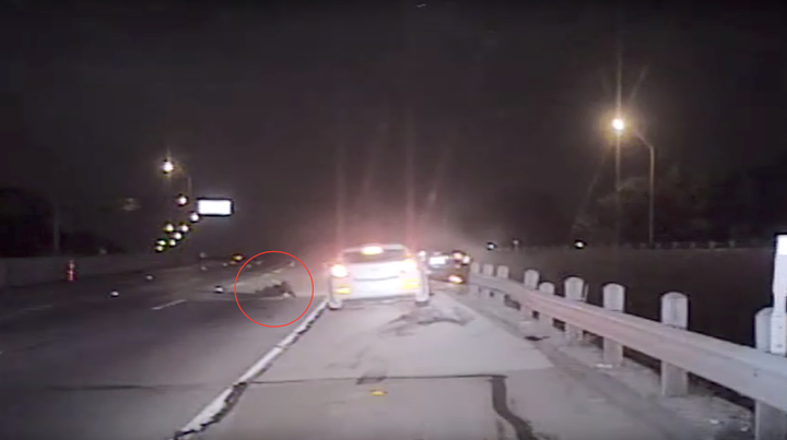 A Fort Worth police officer is seen lying on the road just moments after he was hit by a suspected drunk driver.