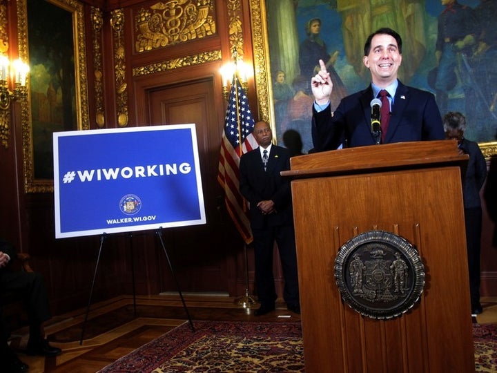 Wisconsin Gov. Scott Walker wants to reduce food stamp benefits for families with children whose parents who do not work at least 80 hours a month or meet related requirements. AP Photo/Scott Bauer