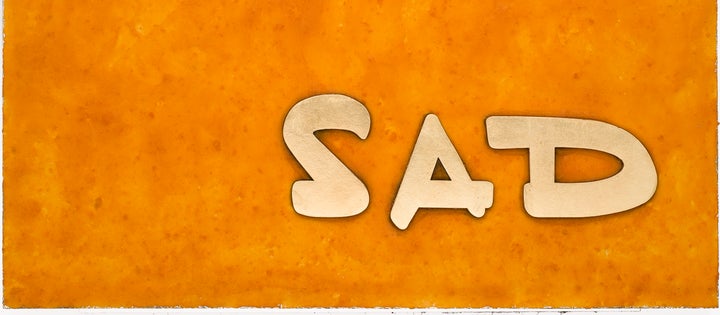 <p><em>Sad, </em>2017, Cheetos, fake gold, acrylic on board, 20”x30”</p>