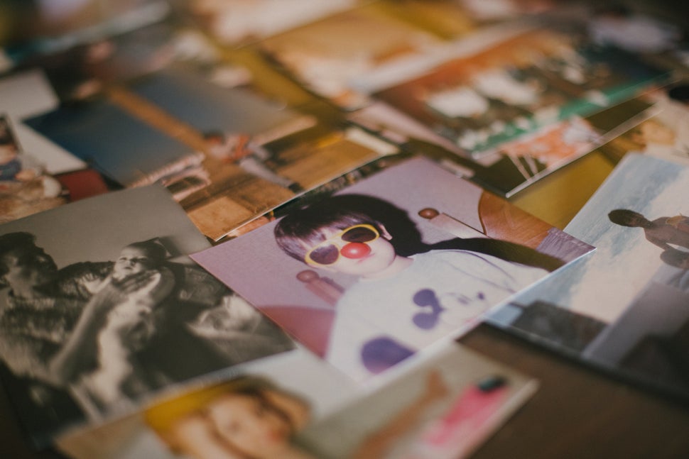 Photos of Enrique are spread out throughout his mother's home as she awaits his release.