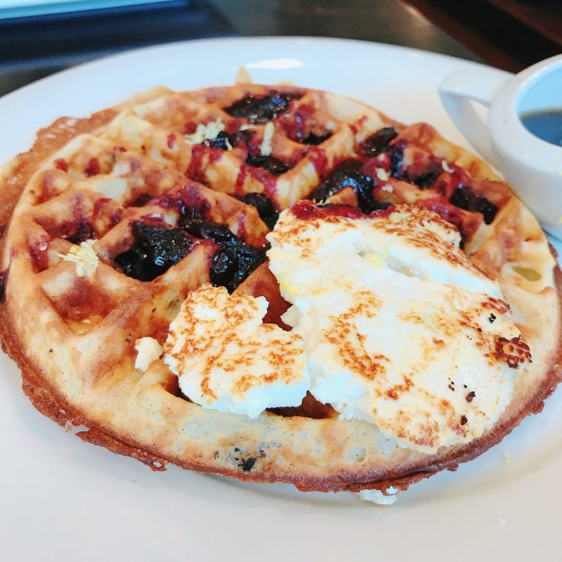 This may just be the best blueberry waffle we have ever had. A vanilla waffle is speckled then topped with crushed blueberrie