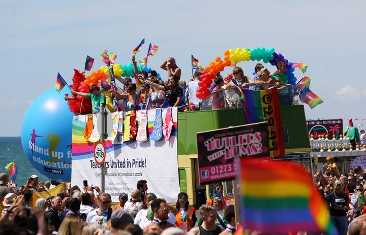 Revellers take part in the Brighton Pride festival parade in 2016