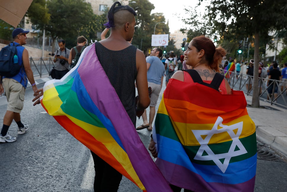 Participants attend the annual Jerusalem Gay Pride Parade on August 3, 2017. 