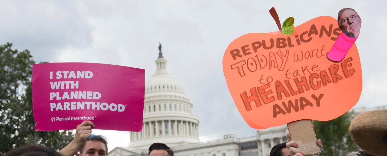 Supporters of Planned Parenthood hold a rally as they protest the US Senate Republicans' healthcare bill outside the US Capitol in Washington, DC, June 27, 2017.