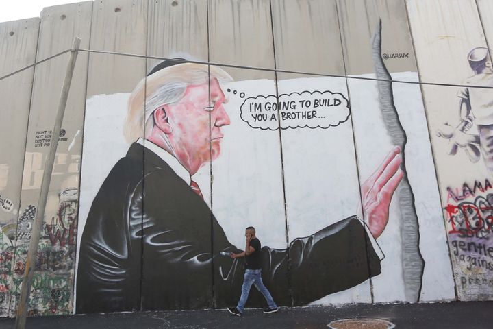LushSux painted this mural featuring President Donald Trump on the Israeli separation barrier in the West Bank town of Bethlehem.