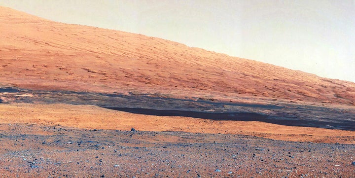 This NASA image taken by the Mast Camera (MastCam) on its Curiosity rover in 2012 highlights the geology of Mount Sharp, a mo