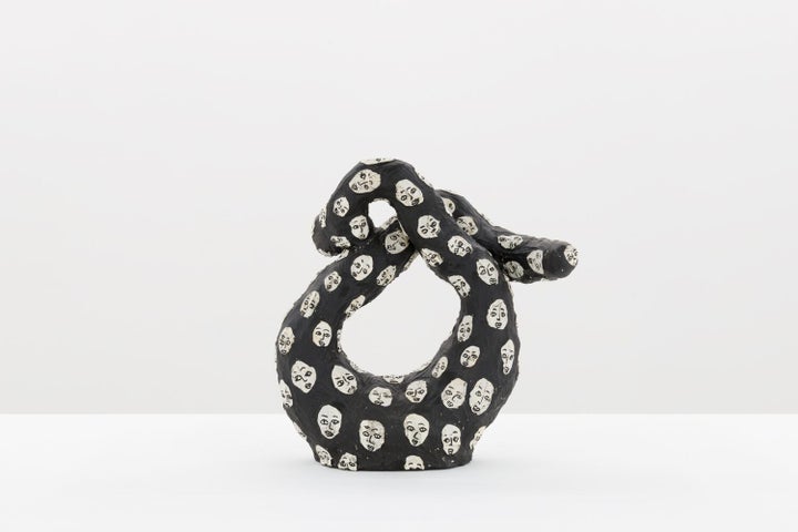 Julia Haft-Candell • <em>Becoming Infinity: Faces</em>, 2017, black clay and underglaze, 15” x 16” x 7”
