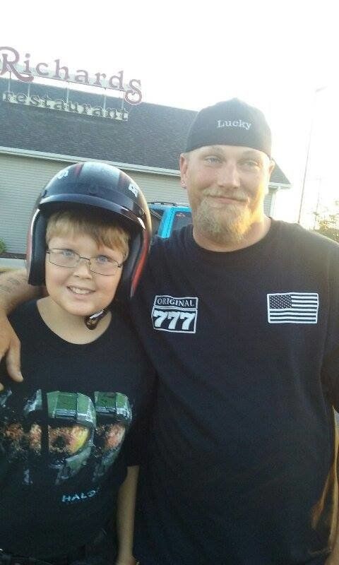 Phil Mick, 11, was all smiles when he met up with members of United Motorcycle Enthusiasts on his first day of school.