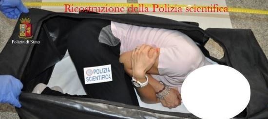 Italian State Police released this photograph on Saturday showing a reenactment of the model's entrapment in the suitcase.