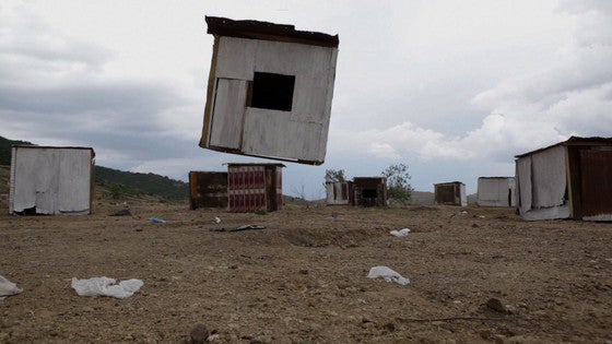 A scene from the video, “The Ghost of Modernity (Lixiviados)” (2012) by the Argentinian artist Miguel Angel Ríos in the show, “Home—So Appealing, So Different”