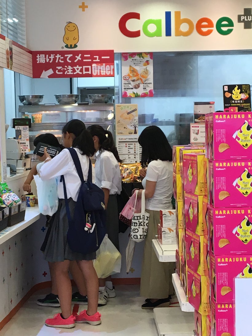 This is only part of the line for Calbee’s fresh-cooked treats. It generally stretches around the side of the store and even