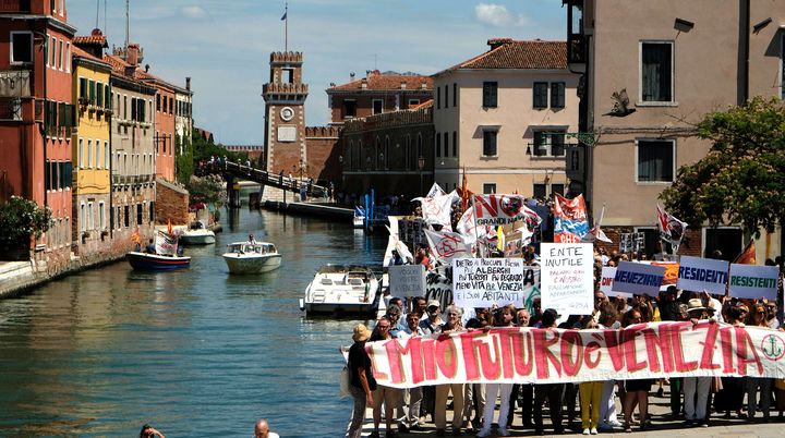 Venice's residents holds a banner " My future is Venice" during a protest in Venice, Italy, July 2, 2017.