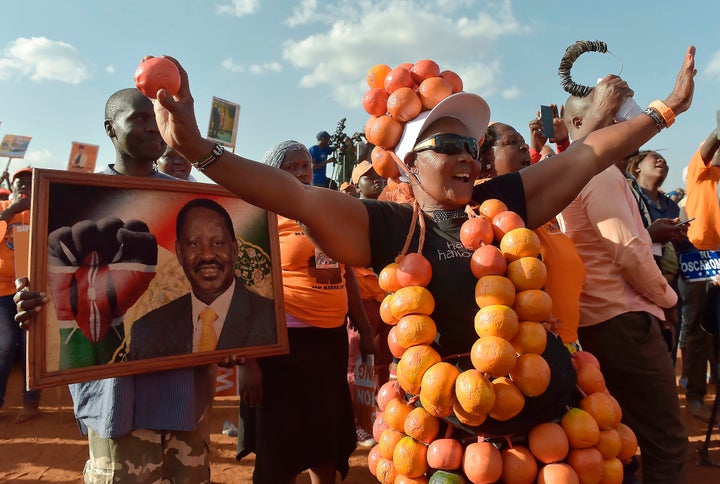 Supporters of the National Super Alliance, or NASA, party listen to Odinga during a campaign rally. Nairobi, July 18.