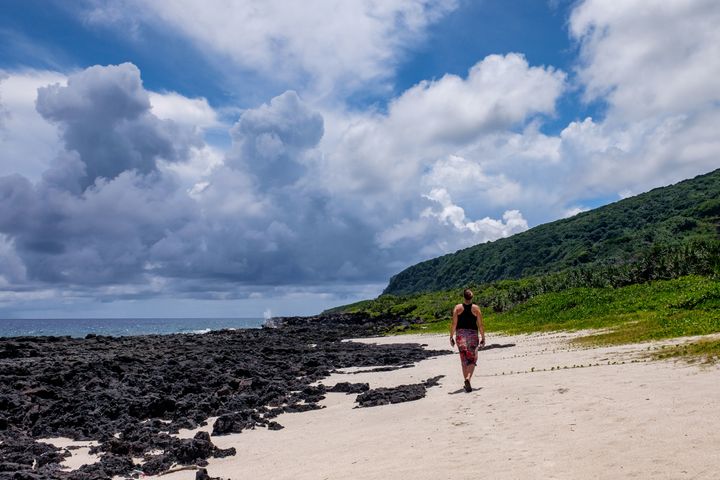 Walking on the island of Ta'u in the National Park of American Samoa. 
