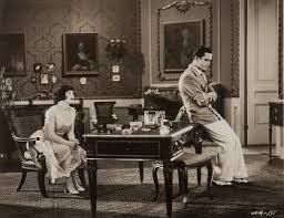 Clara Bow and Buddy Rogers in a scene from Get Your Man 
