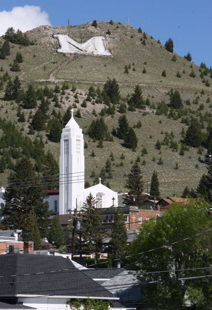 <p>Majestic and Spiritual Tranquility: The Church of the Immaculate Conception at the foot of the Legendary Butte that gave the City its Name</p>