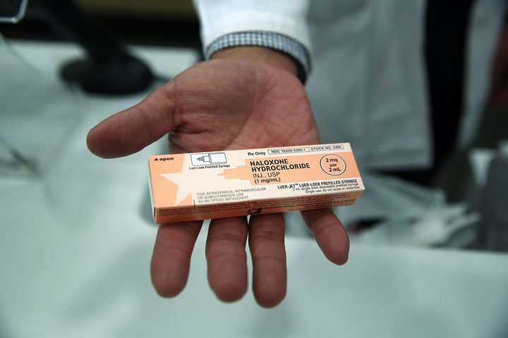  A pharmacist at a Walgreens store holds a box of the overdose antidote Naloxone Hydrochloride (Narcan) on February 2, 2016 in New York City.