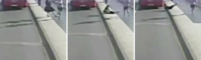 A woman is seen being knocked into the path of an oncoming bus along Putney Bridge in west London on the morning of Friday, May 5.