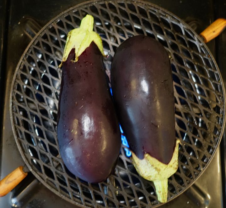 Indoors, char your eggplants over a live flame if you can