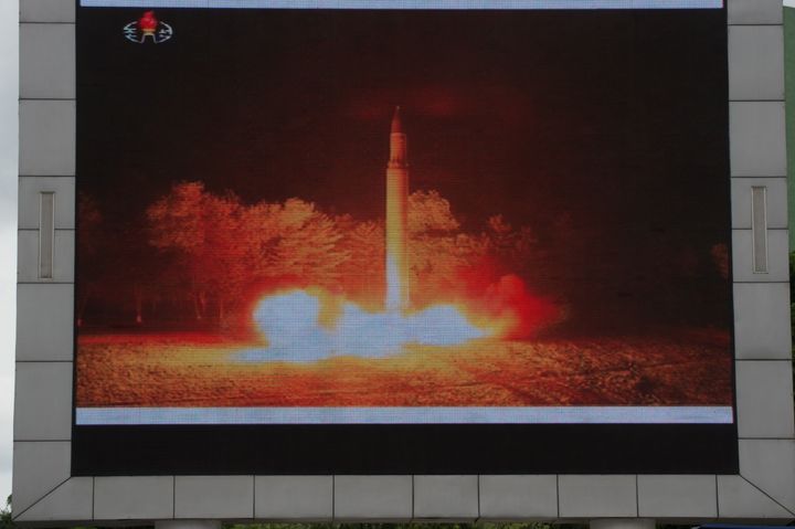 Coverage of an ICBM missile test is displayed on a screen in a public square in Pyongyang on July 29, 2017