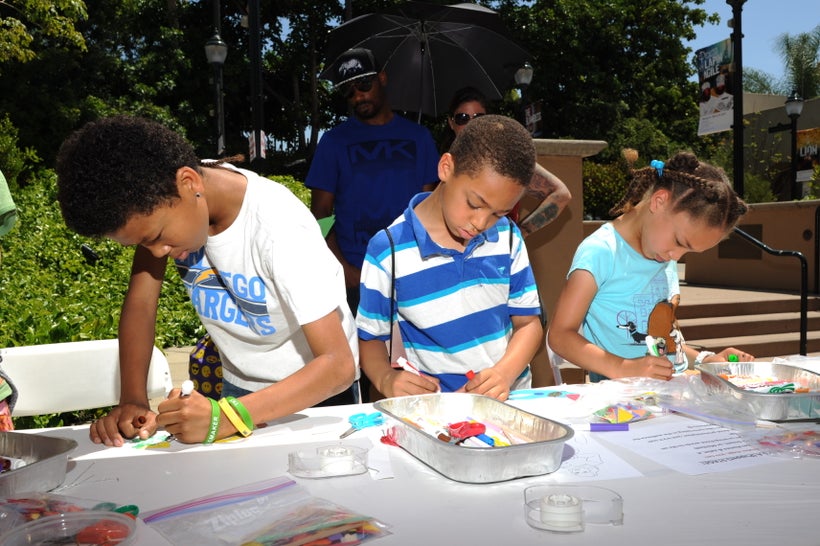 Children create masks for an interactive skit at the event Happy Birthday, Mr. Shakespeare on April 22, 2017