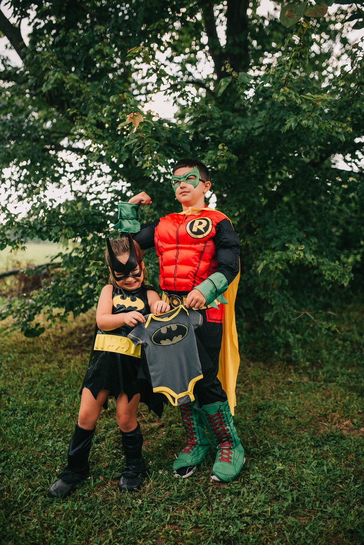 “After noticing a Batman onesie one day while we were shopping, they naturally asked to get it for their baby brother or sister,” the mom recalled. 