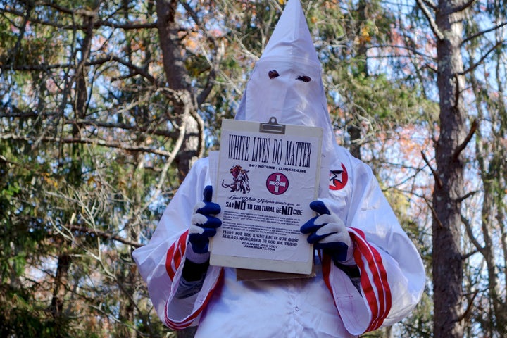 A member of the Ku Klux Klan who says his name is Gary Munker poses for a photo during an interview with AFP in Hampton Bays, New York on November 22, 2016. Munker says his local branch of the KKK, which has recently placed recruitment flyers on car windshields on Long Island, has seen around 1,000 enquiries from people interested in joining since the election of Donald Trump.