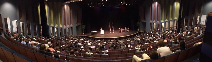 <p>E.J.R. David speaking to the families and friends of 136 new U.S. Citizens who gathered to witness the naturalization ceremony.</p>