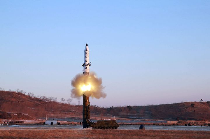 This photo taken on February 12, 2017 shows the launch of a surface-to-surface medium long-range ballistic missile Pukguksong-2 at an undisclosed location in North Korea