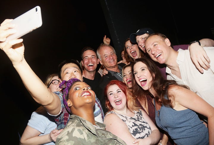 Bill Murray takes a selfie with the cast.