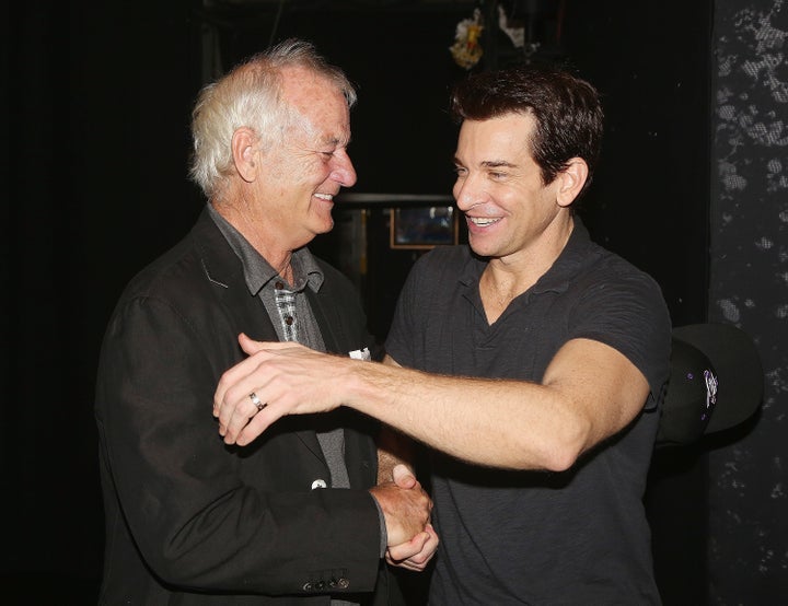 Bill Murray (who played Phill Connors in the film) and Andy Karl (who plays Phil Connors in the musical) embrace.