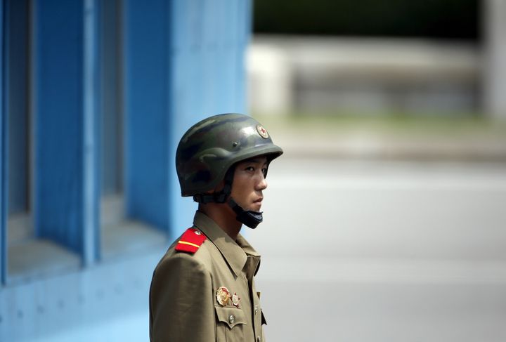 A North Korean soldier keeps watch on the south at the truce village of Panmunjom in the demilitarized zone (DMZ) separating the two Koreas. 