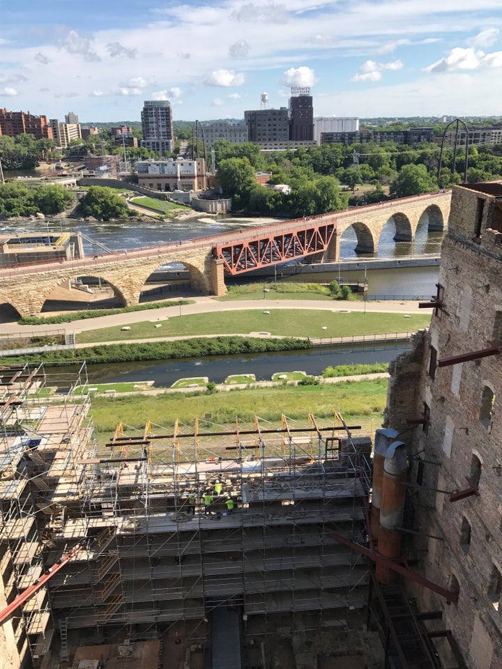 Rebuilding the ruins of the mill and looking across the river to the competition, Pillsbury. 