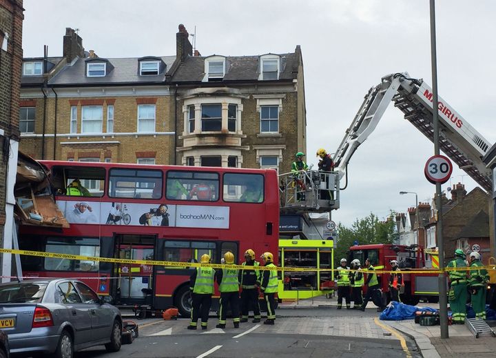 A bus has crashed into a shop front in Lavender Hill 