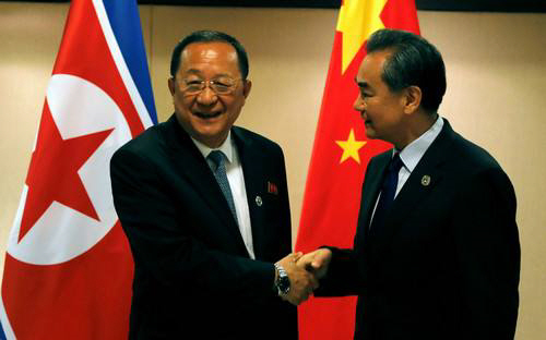 North Korean Foreign Minister Ri Yong-ho and Chinese Foreign Minister Wang Yi. The picture was taken when the both attended the 7th East Asia Summit Foreign Ministers' Meeting./ Source: Xinhua News 