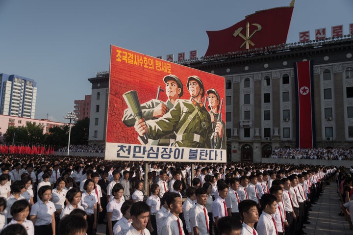 North Koreans rally in support of their country's stance against the U.S. in Kim Il-Sung square in Pyongyang.