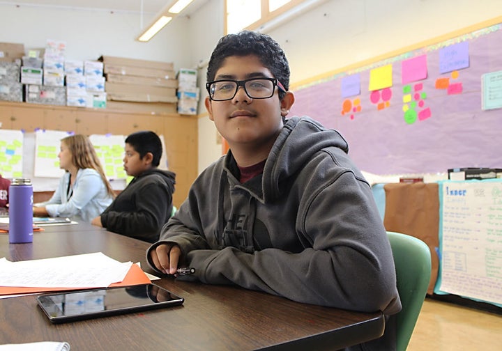 7th-grader Omar Quinitanilla is mapping out a path to a Ph.D. as part of summer learning at Aim High.