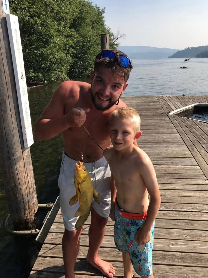 Ryan and Chenz with the first of two fish that they caught