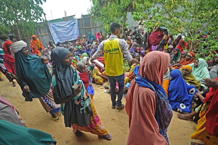 Beneficiaries in Somalia collect their non-food item kit, donated by Irish Aid, and being distributed by Concern Worldwide. Photo: Mohamed Abdiwahab