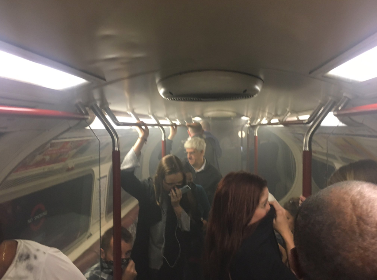 Panicked commuters sprint from Oxford Circus station when smoke engulfs Tube Panicked commuters sprint from Oxford Circus station when smoke engulfs Tube
