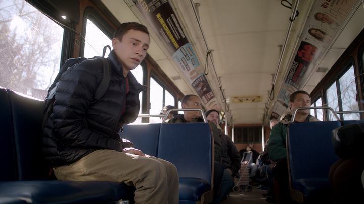 When Sam rides the bus, he can’t let his back touch the seat.