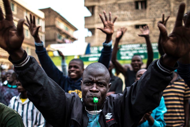 Supporters of Kenyan opposition presidential candidate Raila Odinga march in the Mathare slum in Nairobi on Aug. 10.