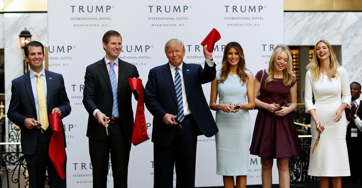 Donald Trump Jr., Eric Trump, Donald Trump, Melania Trump, Tiffany Trump and Ivanka Trump attend an official ribbon-cutting ceremony at the Trump International Hotel in Washington on Oct. 26, 2016. 