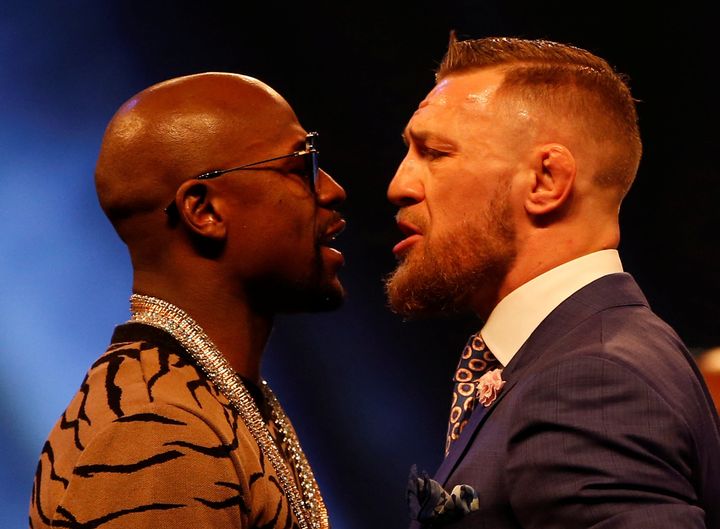 Boxer Floyd Mayweather (left) will face off against UFC fighter Conor McGregor Aug. 26 in Las Vegas. 