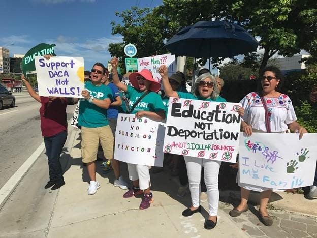<em>FIRM members rally outside Rep. Diaz-Balart’s office in Miami for the #Not1Dollar campaign</em>
