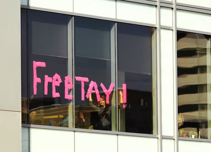 People wrote 'Free Tay!' with sticky notes in an office window across the street from the Alfred A. Arraj Courthouse on August 8, 2017 in Denver, Colorado.