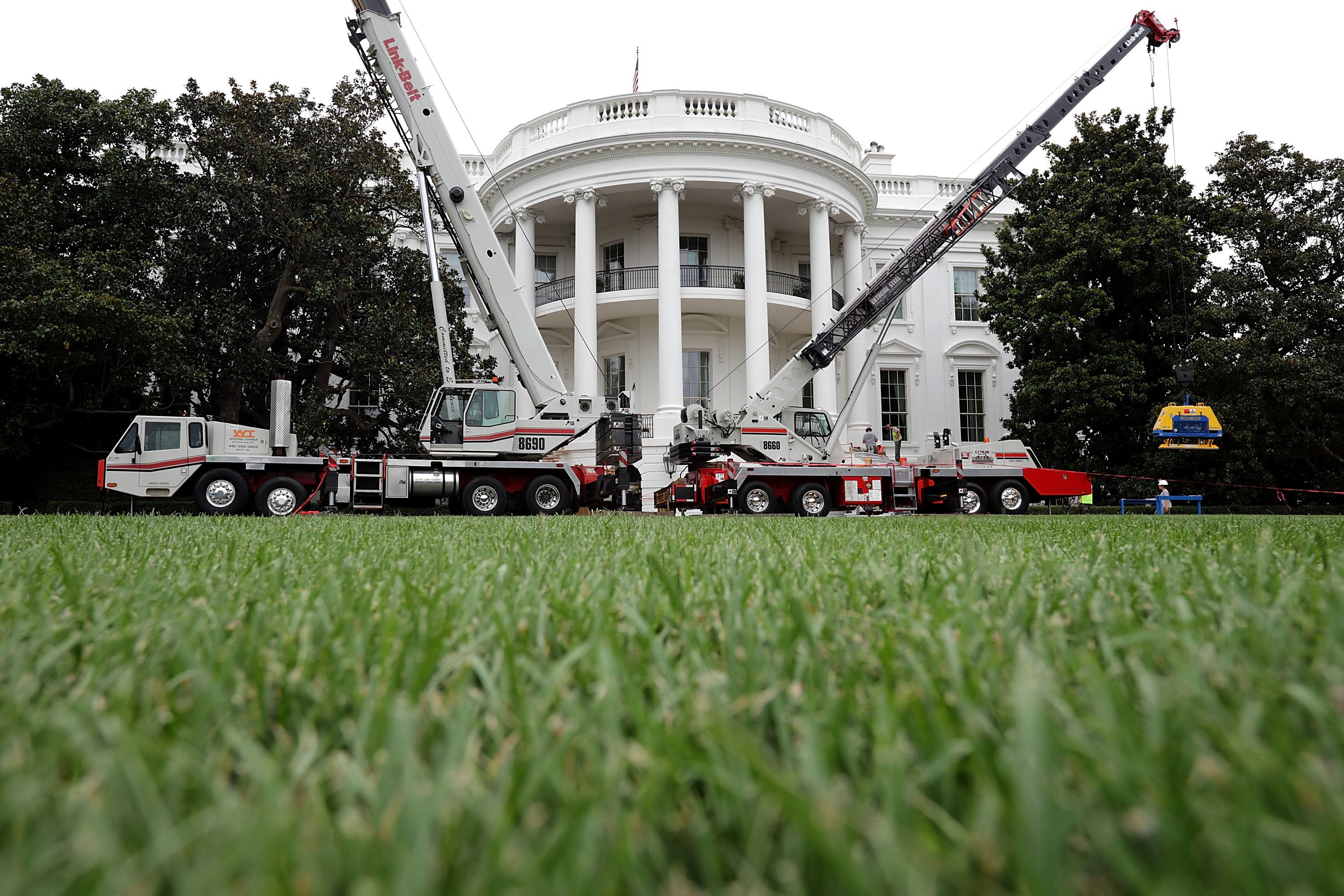 Chip Somodevilla via Getty Images
Construction cranes work to repair the South Portico steps
