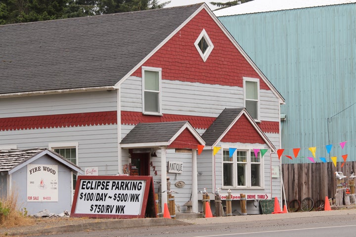 A parking sign in Depoe Bay, Oregon, displays a high price for eclipse visitors.