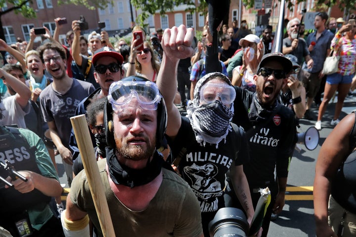 Anti-fascist counter-protesters wait outside Lee Park as white nationalists, white supremacists and neo-Nazis are forced out after the "Unite the Right" rally was declared an unlawful gathering on Saturday in Charlottesville, Virginia. 