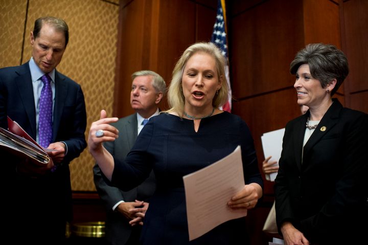 From left, Sen. Ron Wyden (D-OR) Sen. Lindsey Graham (R-SC) Sen. Kirsten Gillibrand (D-NY) and Sen. Joni Ernst (R-IA).